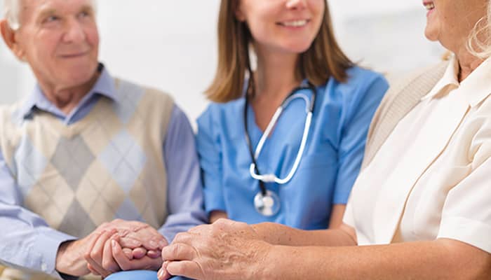 nurse accompanying elderly patients