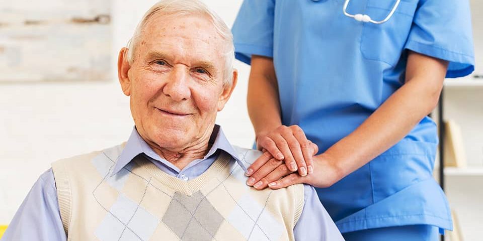 elderly man with his nurse